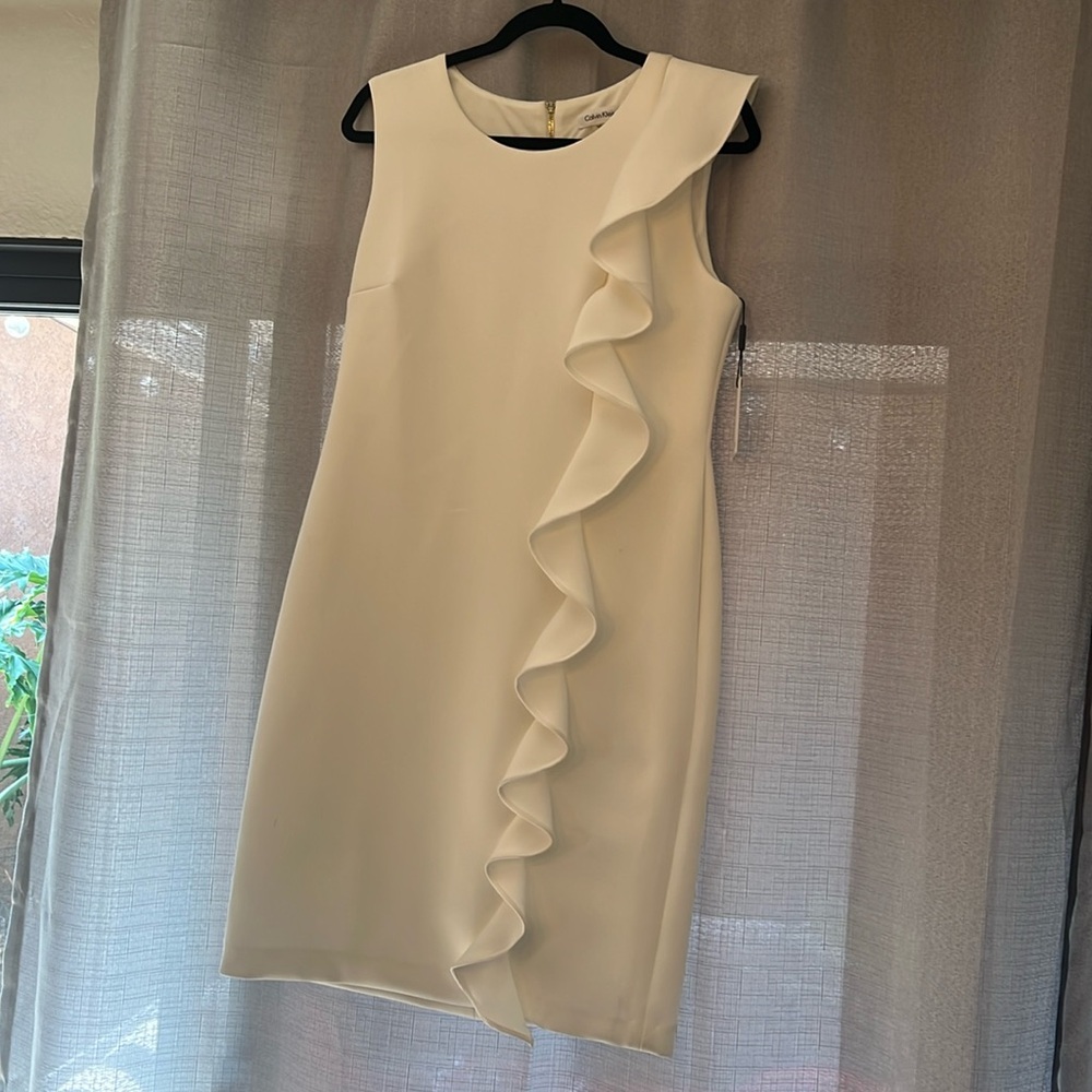 New, never used Calvin Klein cocktail dress. Size 12. Tags still attached.